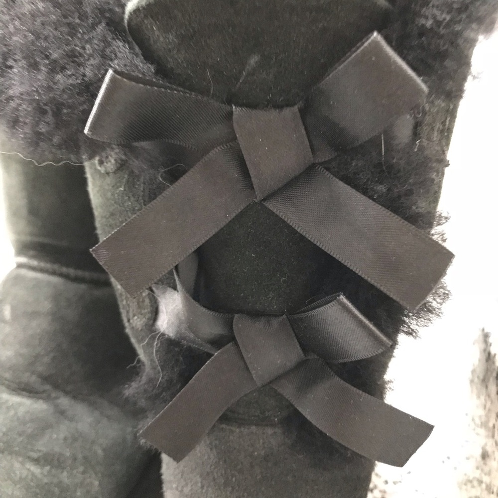 Uggs Black Size 8 with two cute bows in the back